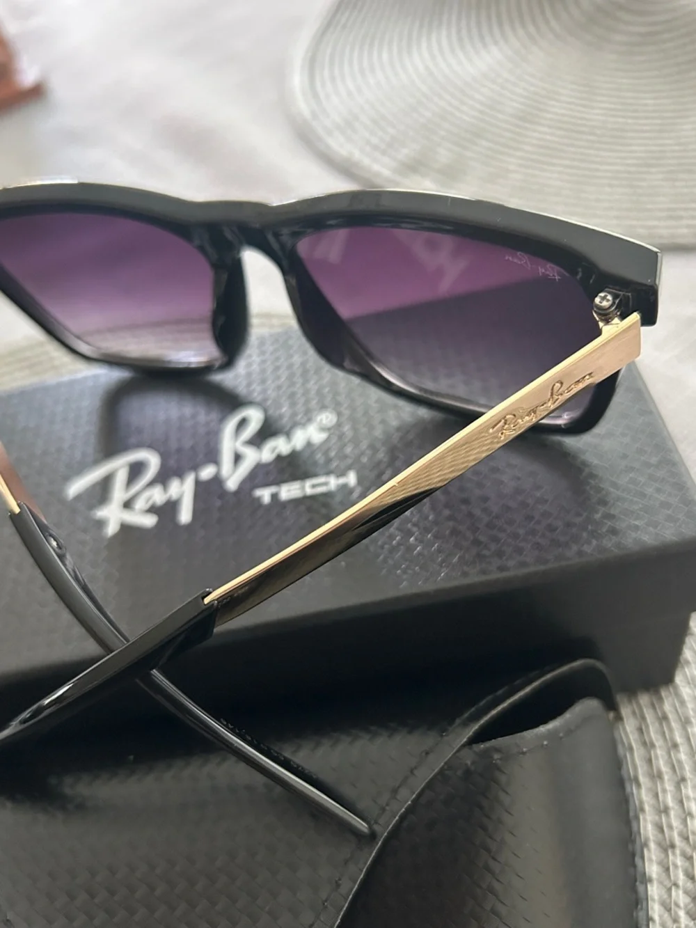 Ray-Ban Matte Black Frame Sunglasses with Purple Tint